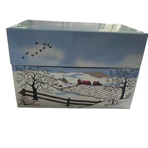 Vintage metal recipe box with snowy farm scene